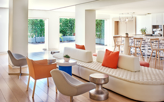 the mondrian long oval tufted leather sofa and chairs beside the lobby coffee shop