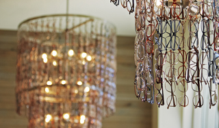 hotel zetta close up of recycled glasses on the chandelier