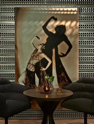 dirty habit sf mural of a dancer in a sparkly net dress posing up to the sky