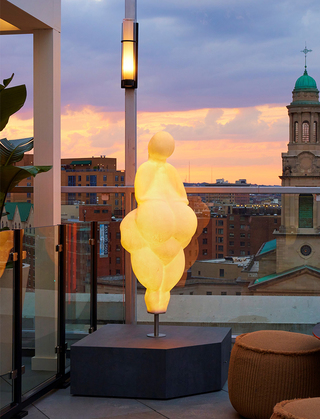 hotel zena close up of the woman light sculpture near the outdoor pool