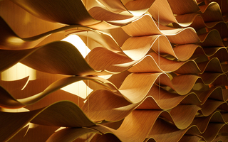 w la close up of the wavy wood wall installation near the reception desk