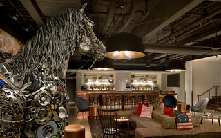 revere hotel close up of the materials used to make the metal horse sculpture in the lobby bar